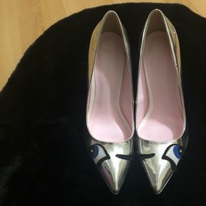 ASOS —> silver heeled pumps with winking eyes design